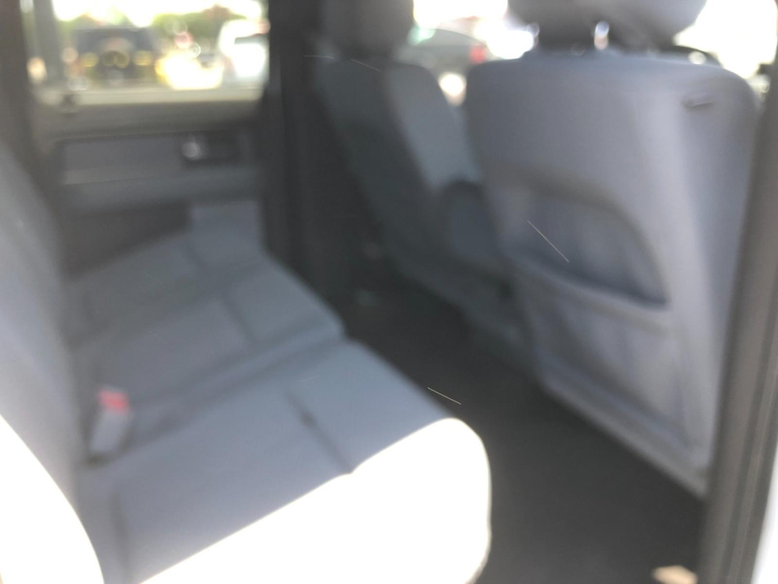 2013 white Ford F-150 FX2 SuperCrew 5.5-ft. Bed 2WD (1FTFW1CF9DF) with an 5.0L V8 engine, 6-Speed Automatic transmission, located at 301 S.first st, garland , TX, 75040, (972) 272-8878, 32.910500, -96.631042 - Photo #9