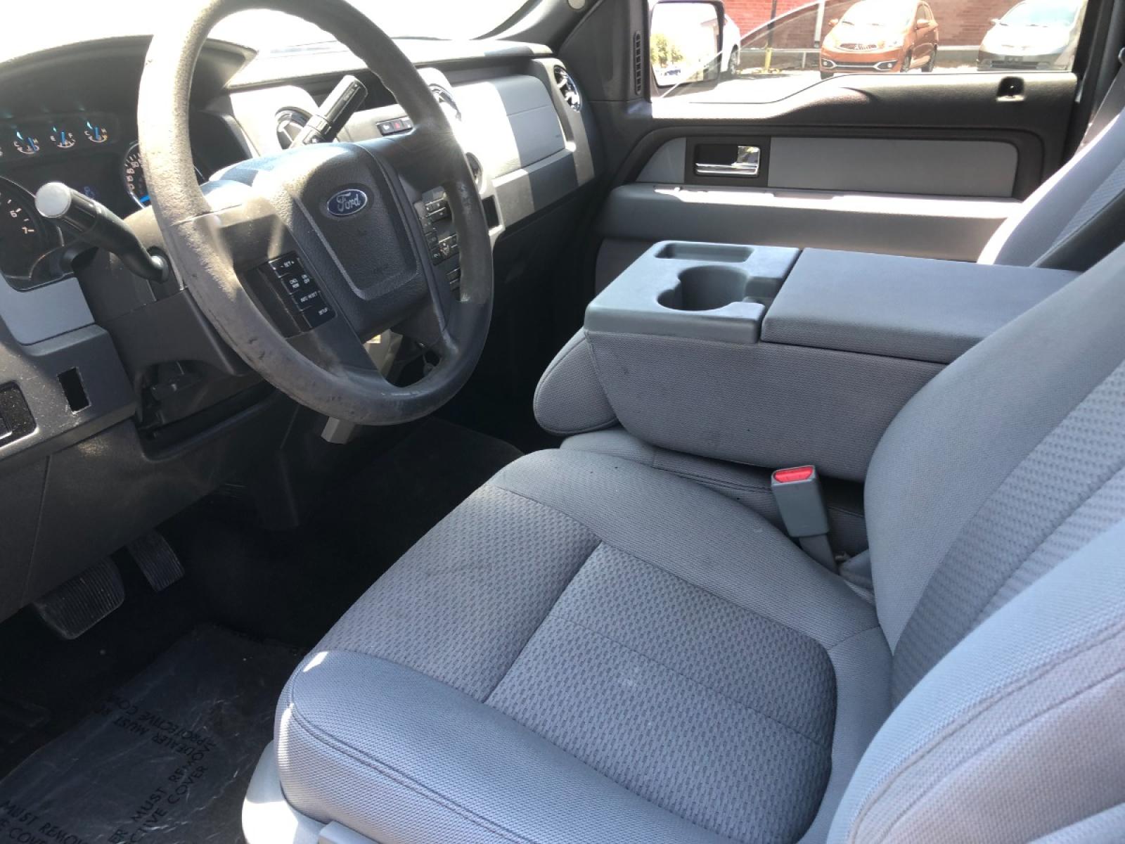 2013 white Ford F-150 FX2 SuperCrew 5.5-ft. Bed 2WD (1FTFW1CF9DF) with an 5.0L V8 engine, 6-Speed Automatic transmission, located at 301 S.first st, garland , TX, 75040, (972) 272-8878, 32.910500, -96.631042 - Photo #10