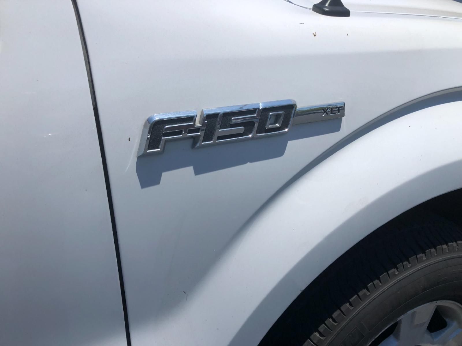 2013 white Ford F-150 FX2 SuperCrew 5.5-ft. Bed 2WD (1FTFW1CF9DF) with an 5.0L V8 engine, 6-Speed Automatic transmission, located at 301 S.first st, garland , TX, 75040, (972) 272-8878, 32.910500, -96.631042 - Photo #6