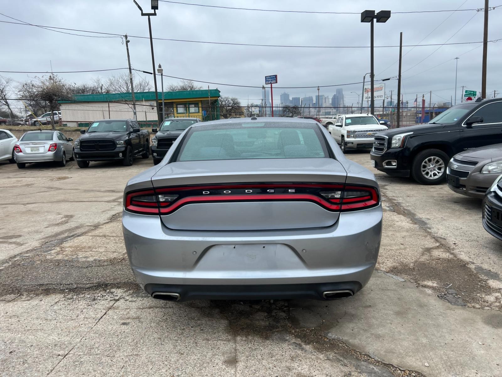 2015 Dodge Charger SE (2C3CDXBG7FH) with an 3.6L V6 DOHC 24V engine, 8-Speed Automatic transmission, located at 945 E. Jefferson Blvd, Dallas, TX, 75203, (214) 943-7777, 32.752514, -96.811630 - Photo #3