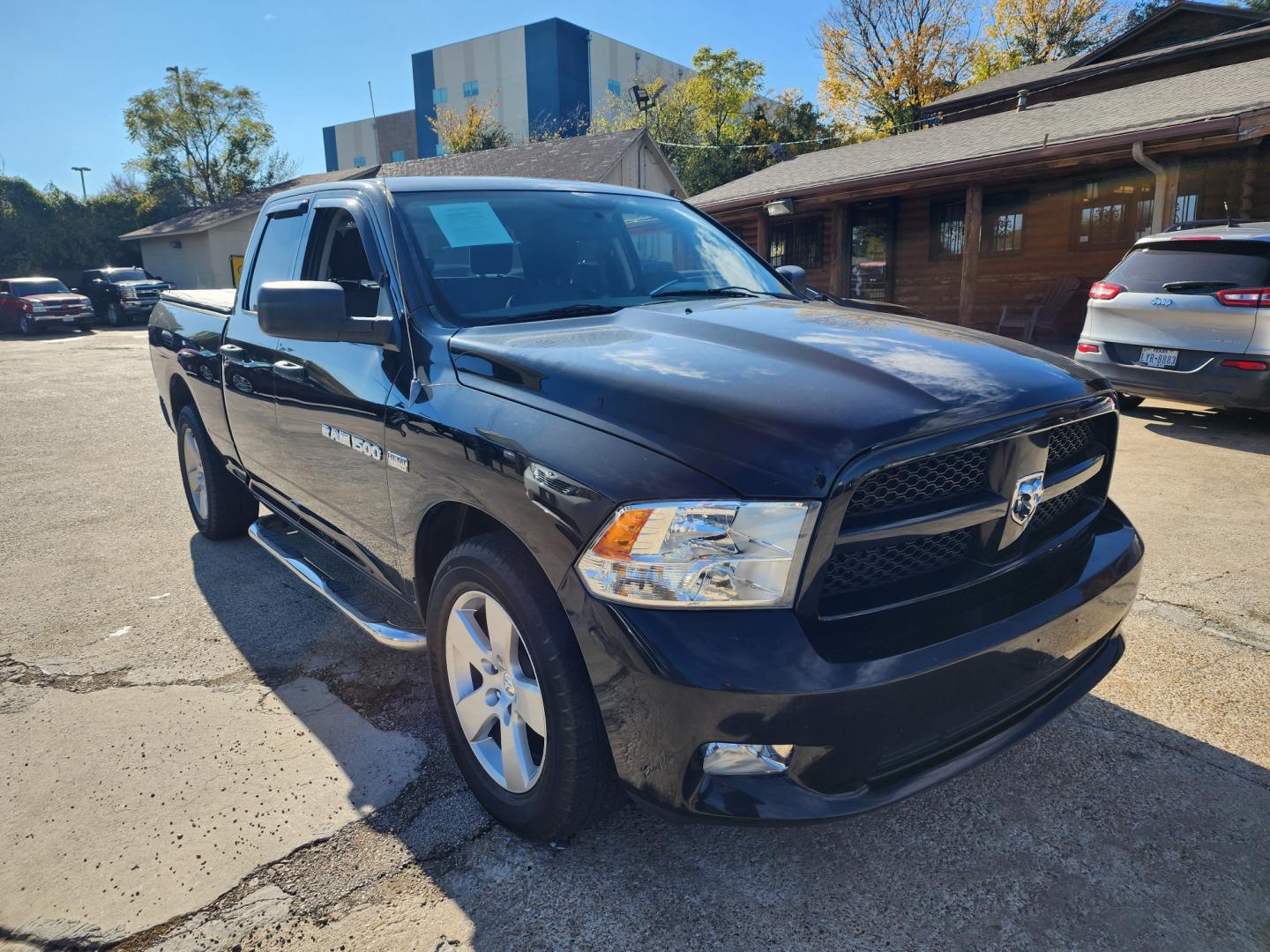 2012 Dodge Ram 1500 ST Quad Cab 4WD (1C6RD7FT2CS) with an 5.7L V8 OHV 16V engine, 6-Speed Automatic transmission, located at 945 E. Jefferson Blvd, Dallas, TX, 75203, (214) 943-7777, 32.752514, -96.811630 - Photo#2