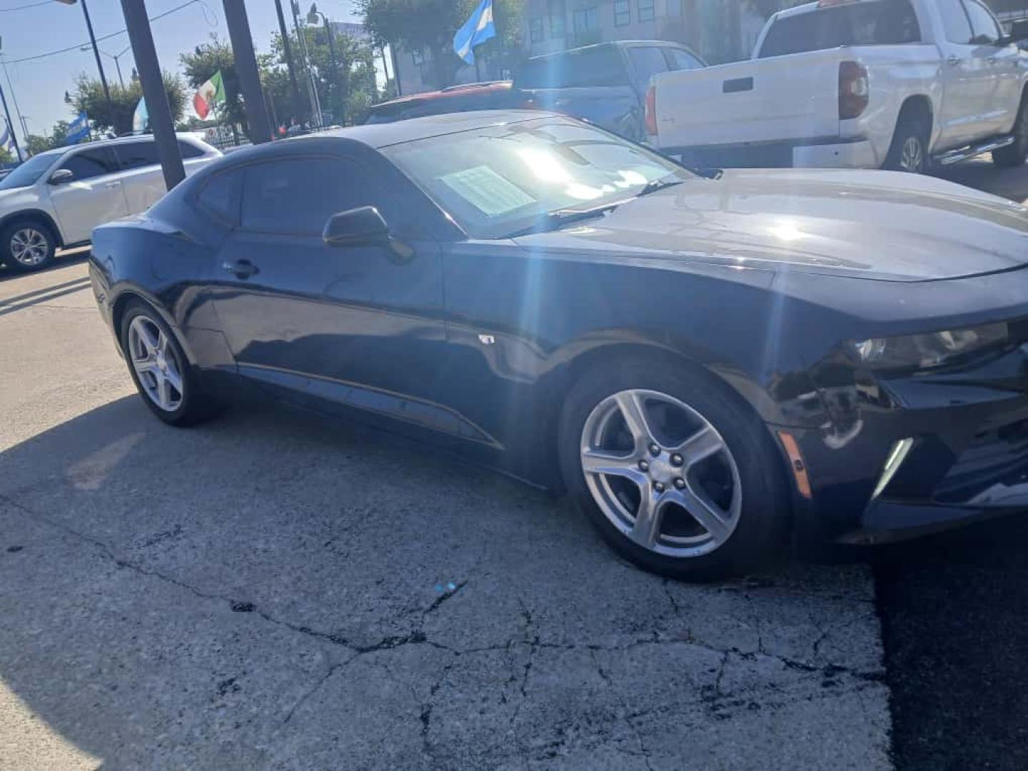 2017 Black Chevrolet Camaro 1LT Coupe (1G1FB1RS1H0) with an 3.6L V6 DOHC 24V engine, 6A transmission, located at 945 E. Jefferson Blvd, Dallas, TX, 75203, (214) 943-7777, 32.752514, -96.811630 - Photo#2