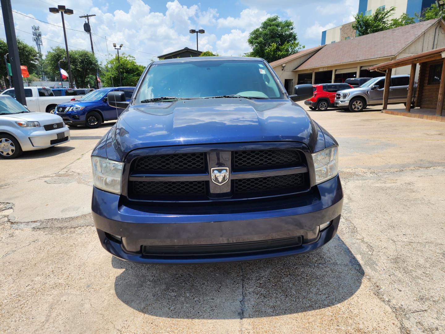 2012 Dodge Ram 1500 ST SWB 2WD (3C6JD6AT9CG) with an 5.7L V8 OHV 16V engine, 6-Speed Automatic transmission, located at 945 E. Jefferson Blvd, Dallas, TX, 75203, (214) 943-7777, 32.752514, -96.811630 - Photo#1