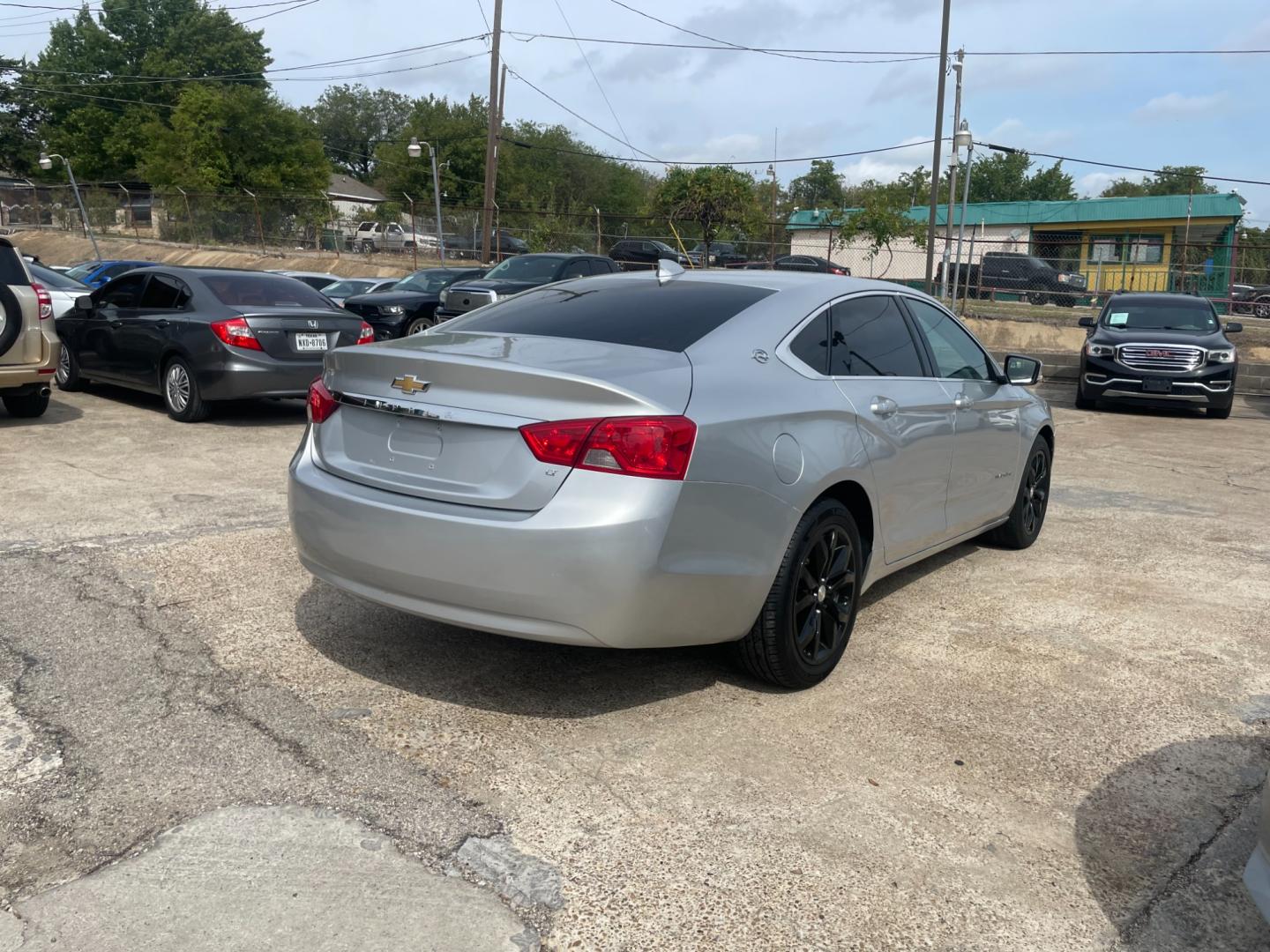 2019 Chevrolet Impala LT (1G11Z5SA1KU) with an 2.5L L4 DOHC 16V engine, 6A transmission, located at 945 E. Jefferson Blvd, Dallas, TX, 75203, (214) 943-7777, 32.752514, -96.811630 - Photo#2