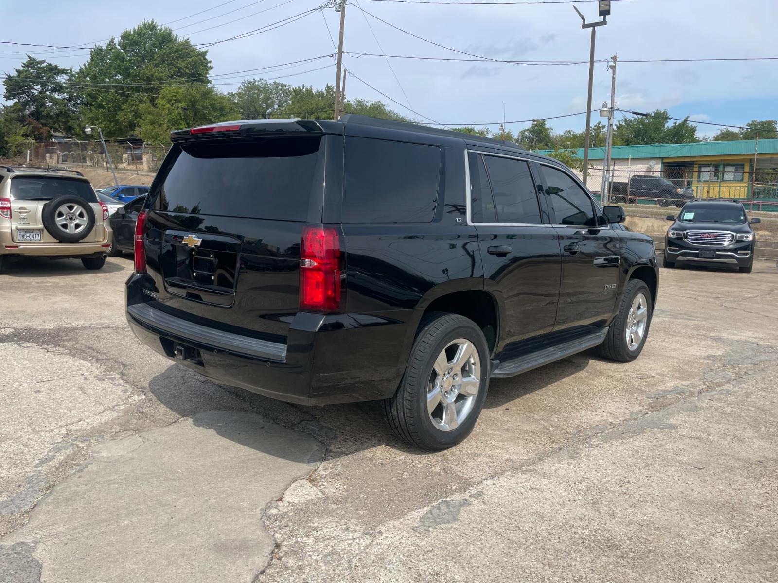 2015 Chevrolet Tahoe LT 4WD (1GNSKBKC6FR) with an 5.3L V8 OHV 16V engine, 6-Speed Automatic transmission, located at 945 E. Jefferson Blvd, Dallas, TX, 75203, (214) 943-7777, 32.752514, -96.811630 - Photo #2