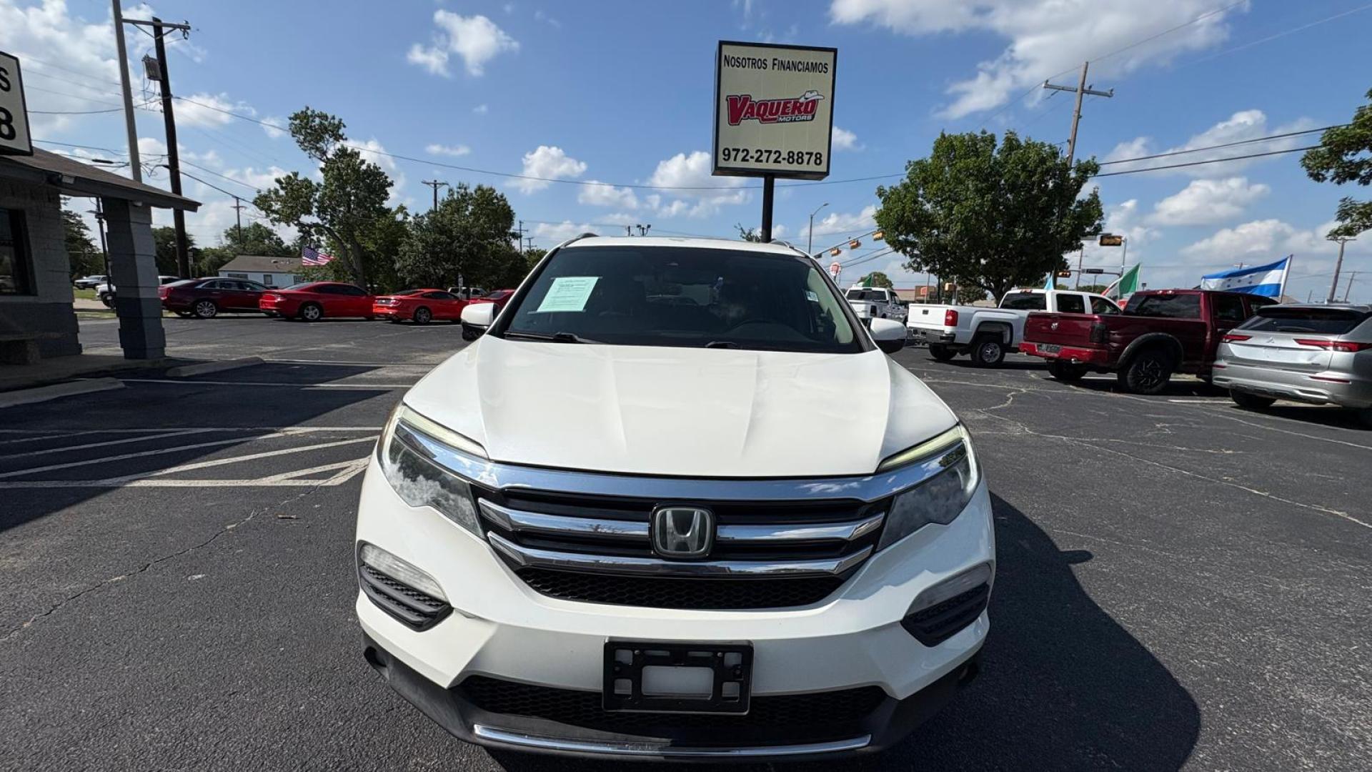 2016 White Honda Pilot Touring 2WD (5FNYF5H98GB) with an 3.5L V6 SOHC 24V engine, 9-Speed Automatic transmission, located at 945 E. Jefferson Blvd, Dallas, TX, 75203, (214) 943-7777, 32.752514, -96.811630 - Photo#1