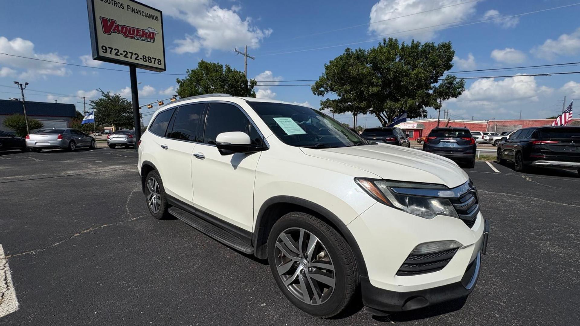 2016 White Honda Pilot Touring 2WD (5FNYF5H98GB) with an 3.5L V6 SOHC 24V engine, 9-Speed Automatic transmission, located at 945 E. Jefferson Blvd, Dallas, TX, 75203, (214) 943-7777, 32.752514, -96.811630 - Photo#2