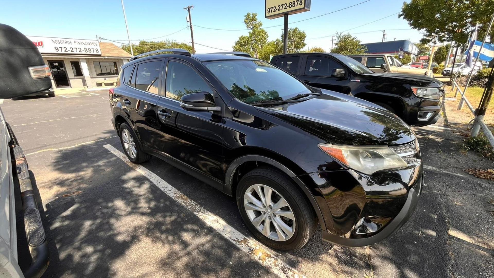2015 Black Toyota RAV4 (2T3YFREV7FW) , located at 945 E. Jefferson Blvd, Dallas, TX, 75203, (214) 943-7777, 32.752514, -96.811630 - Photo#2