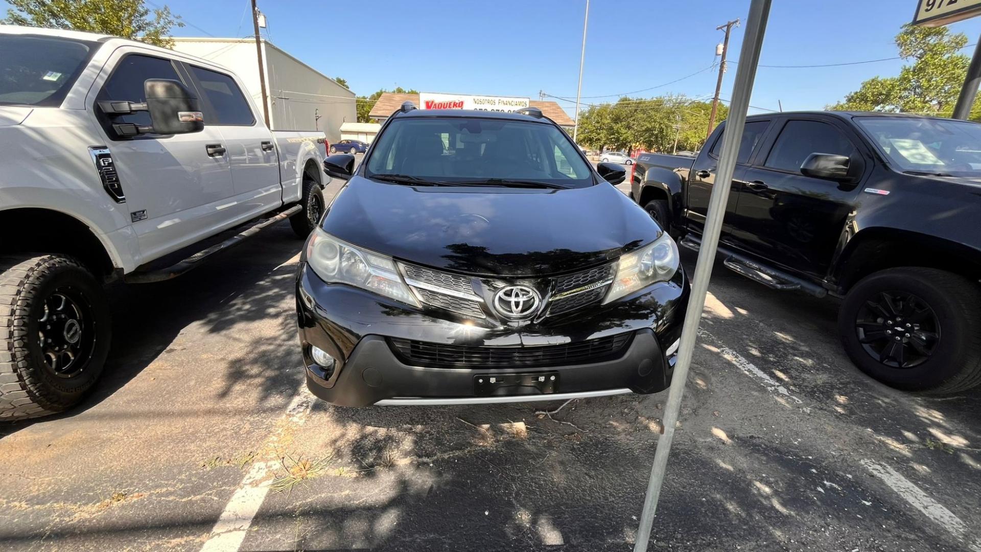 2015 Black Toyota RAV4 (2T3YFREV7FW) , located at 945 E. Jefferson Blvd, Dallas, TX, 75203, (214) 943-7777, 32.752514, -96.811630 - Photo#1