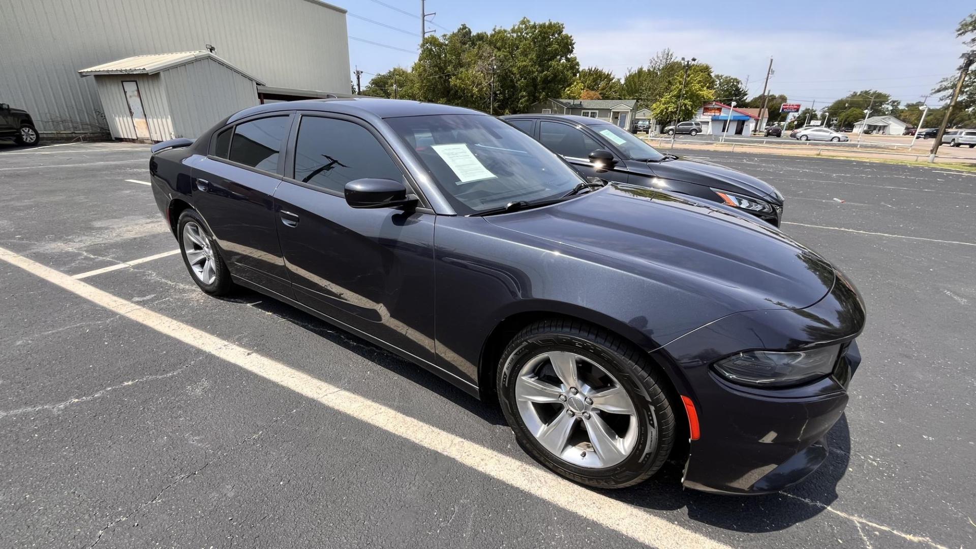 2016 Dodge Charger SXT (2C3CDXHG4GH) with an 3.6L V6 DOHC 24V engine, 8A transmission, located at 945 E. Jefferson Blvd, Dallas, TX, 75203, (214) 943-7777, 32.752514, -96.811630 - Photo#2