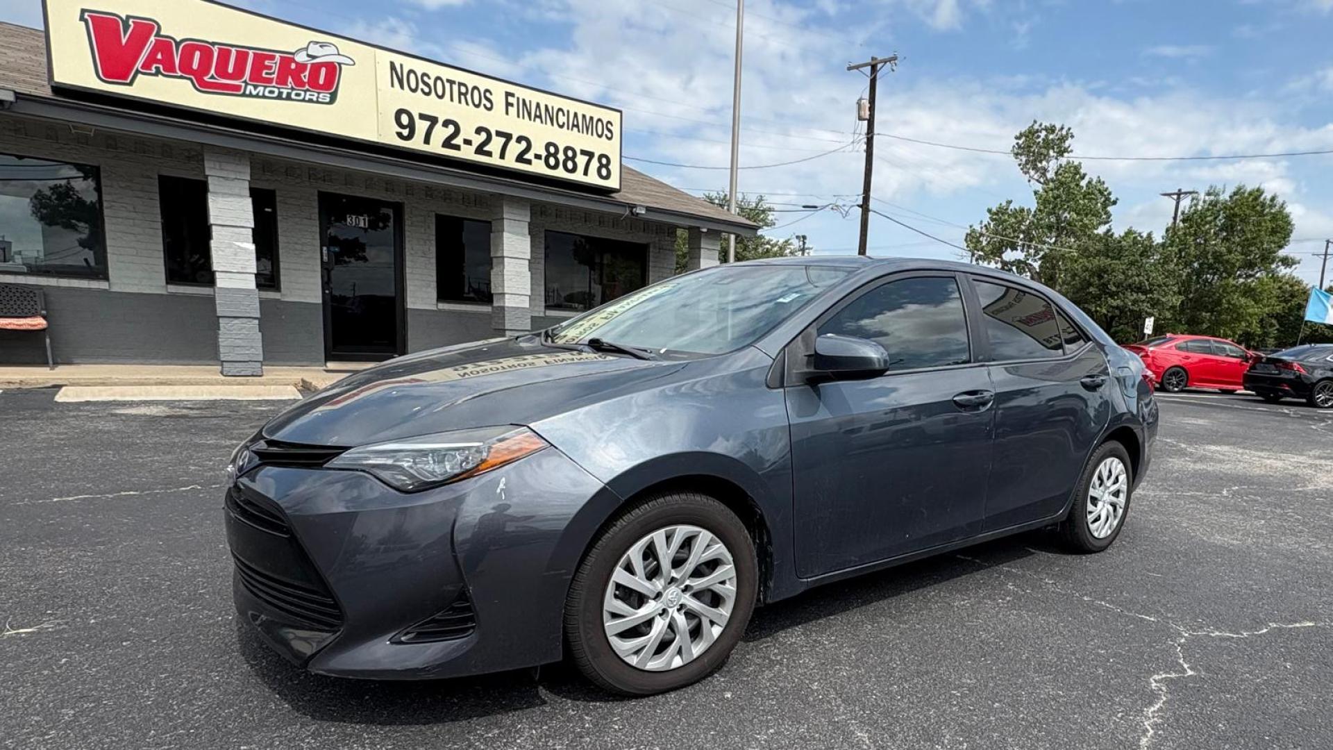2018 Gray Toyota Corolla SE 6M (5YFBURHE7JP) with an 1.8L L4 DOHC 16V engine, 6M transmission, located at 945 E. Jefferson Blvd, Dallas, TX, 75203, (214) 943-7777, 32.752514, -96.811630 - Photo#0