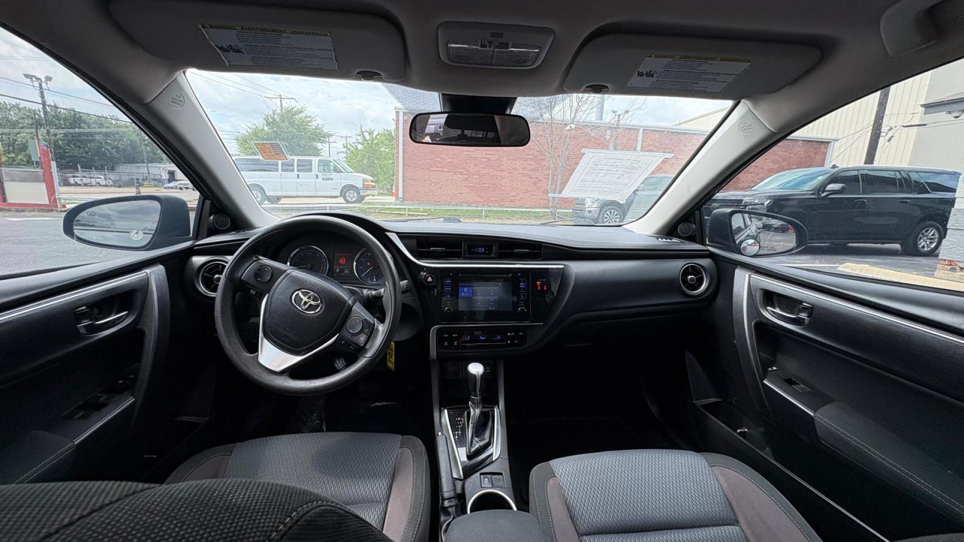 2018 Gray Toyota Corolla SE 6M (5YFBURHE7JP) with an 1.8L L4 DOHC 16V engine, 6M transmission, located at 945 E. Jefferson Blvd, Dallas, TX, 75203, (214) 943-7777, 32.752514, -96.811630 - Photo#4