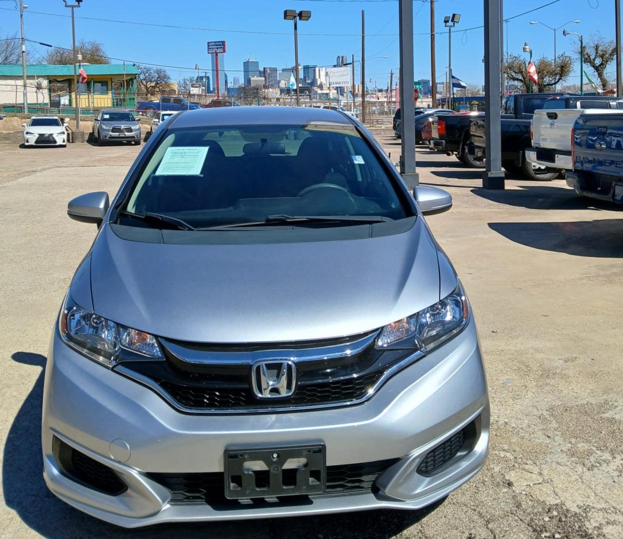 2019 Silver Honda Fit LX CVT (3HGGK5H43KM) with an 1.5L L4 SOHC 16V engine, CVT transmission, located at 945 E. Jefferson Blvd, Dallas, TX, 75203, (214) 943-7777, 32.752514, -96.811630 - Photo#1