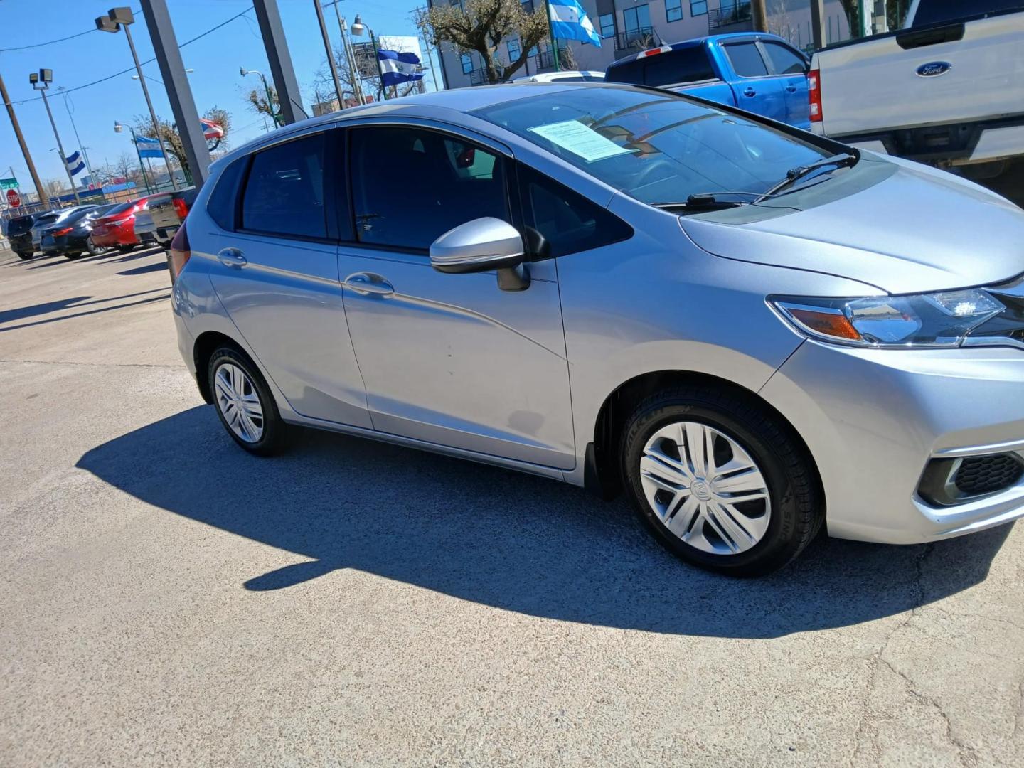 2019 Silver Honda Fit LX CVT (3HGGK5H43KM) with an 1.5L L4 SOHC 16V engine, CVT transmission, located at 945 E. Jefferson Blvd, Dallas, TX, 75203, (214) 943-7777, 32.752514, -96.811630 - Photo#2