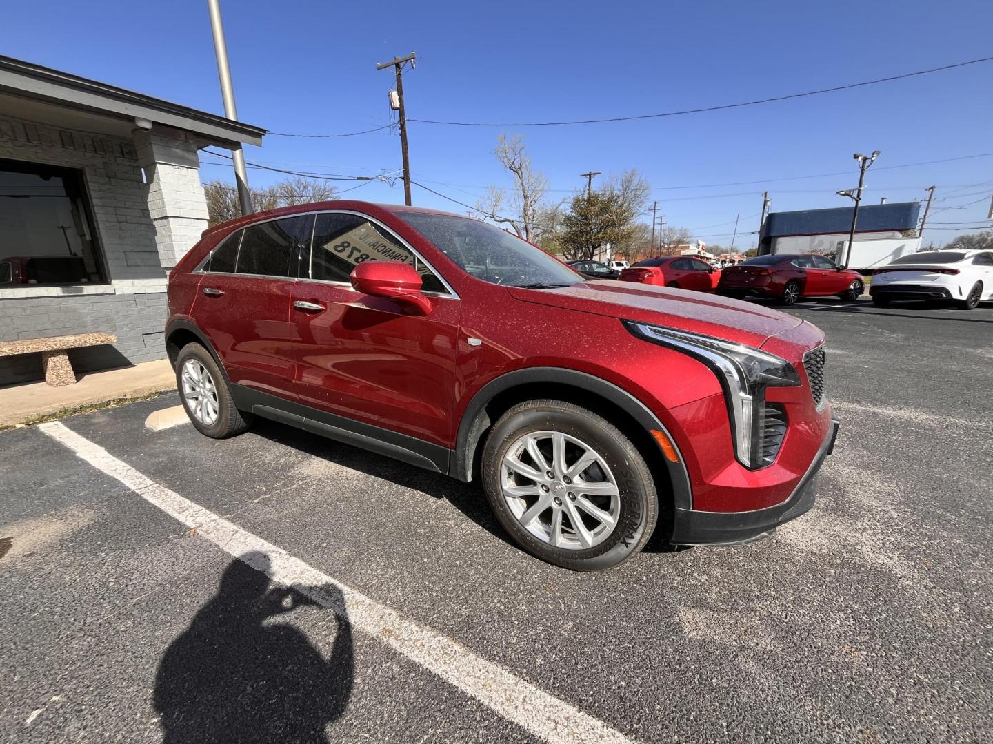 2019 Red Cadillac XT4 Luxury (1GYAZAR44KF) with an 2.0L L4 DOHC 16V engine, 9A transmission, located at 945 E. Jefferson Blvd, Dallas, TX, 75203, (214) 943-7777, 32.752514, -96.811630 - Photo#2