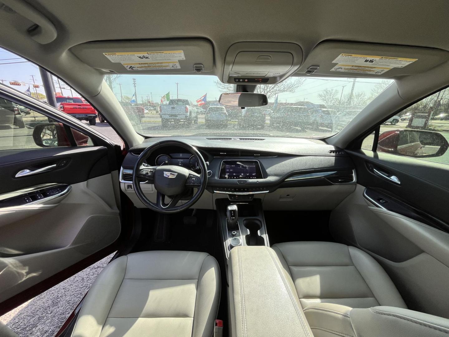 2019 Red Cadillac XT4 Luxury (1GYAZAR44KF) with an 2.0L L4 DOHC 16V engine, 9A transmission, located at 945 E. Jefferson Blvd, Dallas, TX, 75203, (214) 943-7777, 32.752514, -96.811630 - Photo#4