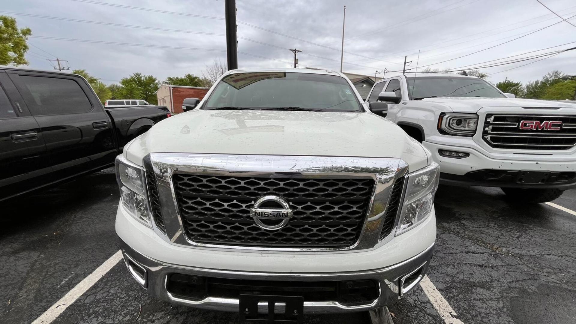 2017 White Nissan Titan S Crew Cab 2WD (1N6AA1E68HN) with an 5.6L V8 DOHC 32V engine, 6A transmission, located at 945 E. Jefferson Blvd, Dallas, TX, 75203, (214) 943-7777, 32.752514, -96.811630 - Photo#1