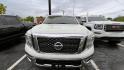 2017 White Nissan Titan S Crew Cab 2WD (1N6AA1E68HN) with an 5.6L V8 DOHC 32V engine, 6A transmission, located at 945 E. Jefferson Blvd, Dallas, TX, 75203, (214) 943-7777, 32.752514, -96.811630 - Photo#1