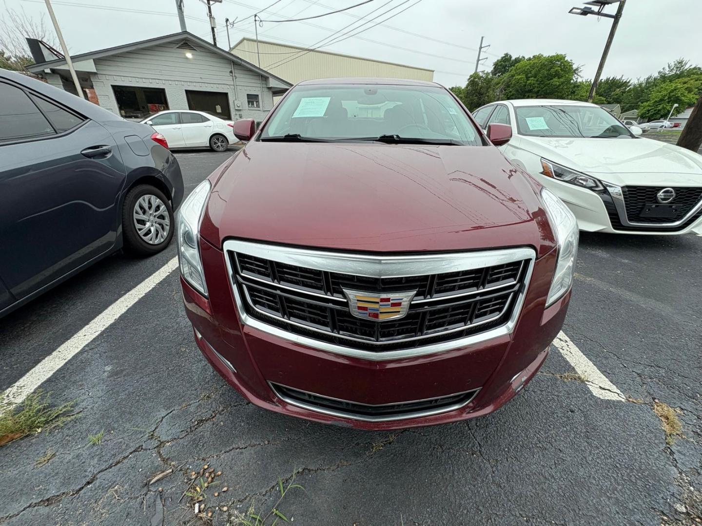 2017 Red Cadillac XTS Luxury FWD (2G61M5S38H9) with an 3.6L V6 DOHC 24V engine, 6A transmission, located at 945 E. Jefferson Blvd, Dallas, TX, 75203, (214) 943-7777, 32.752514, -96.811630 - Photo#1