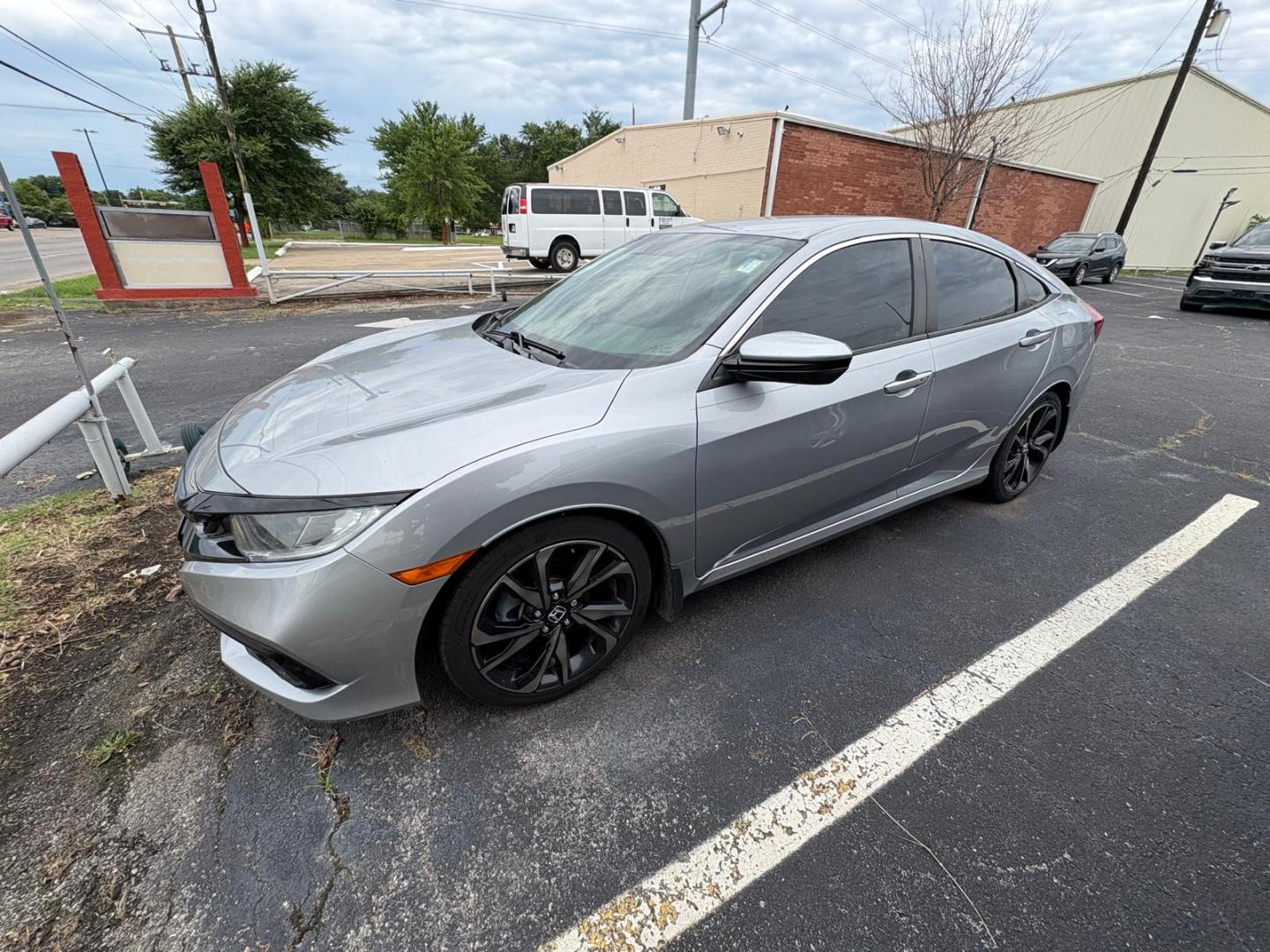 2019 Silver Honda Civic EX Honda Sensing Sedan CVT (2HGFC2F83KH) with an 2.0L L4 DOHC 16V engine, CVT transmission, located at 945 E. Jefferson Blvd, Dallas, TX, 75203, (214) 943-7777, 32.752514, -96.811630 - Photo#0