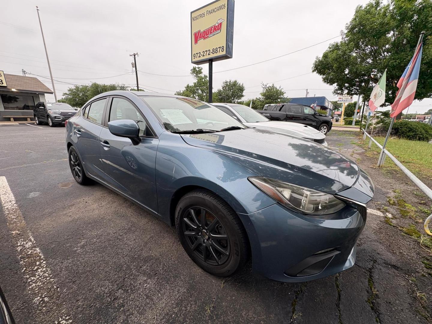2015 Blue Mazda MAZDA3 i Sport AT 4-Door (3MZBM1U78FM) with an 2.0L L4 DOHC 16V engine, 6-Speed Automatic transmission, located at 945 E. Jefferson Blvd, Dallas, TX, 75203, (214) 943-7777, 32.752514, -96.811630 - Photo#2