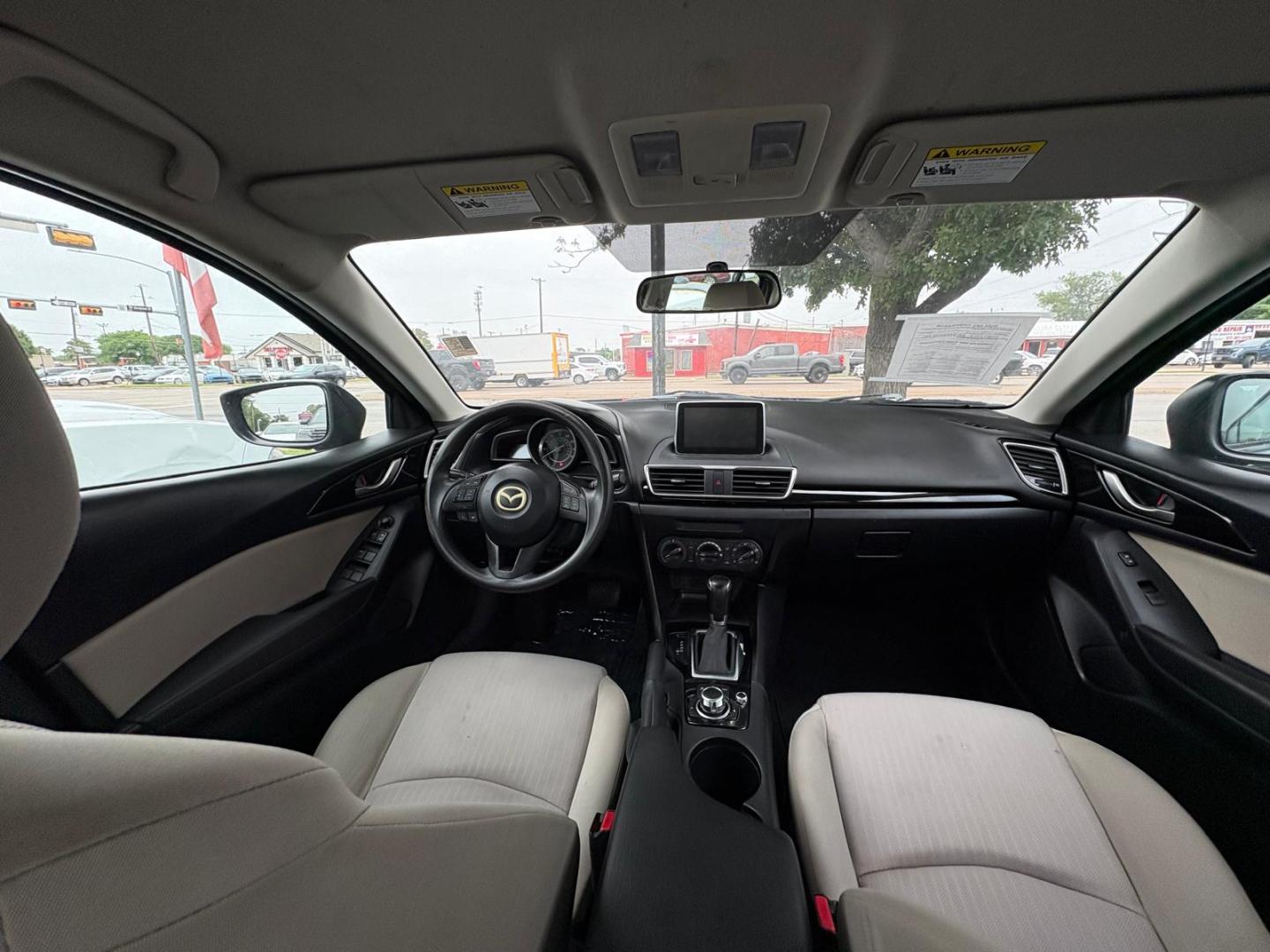 2015 Blue Mazda MAZDA3 i Sport AT 4-Door (3MZBM1U78FM) with an 2.0L L4 DOHC 16V engine, 6-Speed Automatic transmission, located at 945 E. Jefferson Blvd, Dallas, TX, 75203, (214) 943-7777, 32.752514, -96.811630 - Photo#4