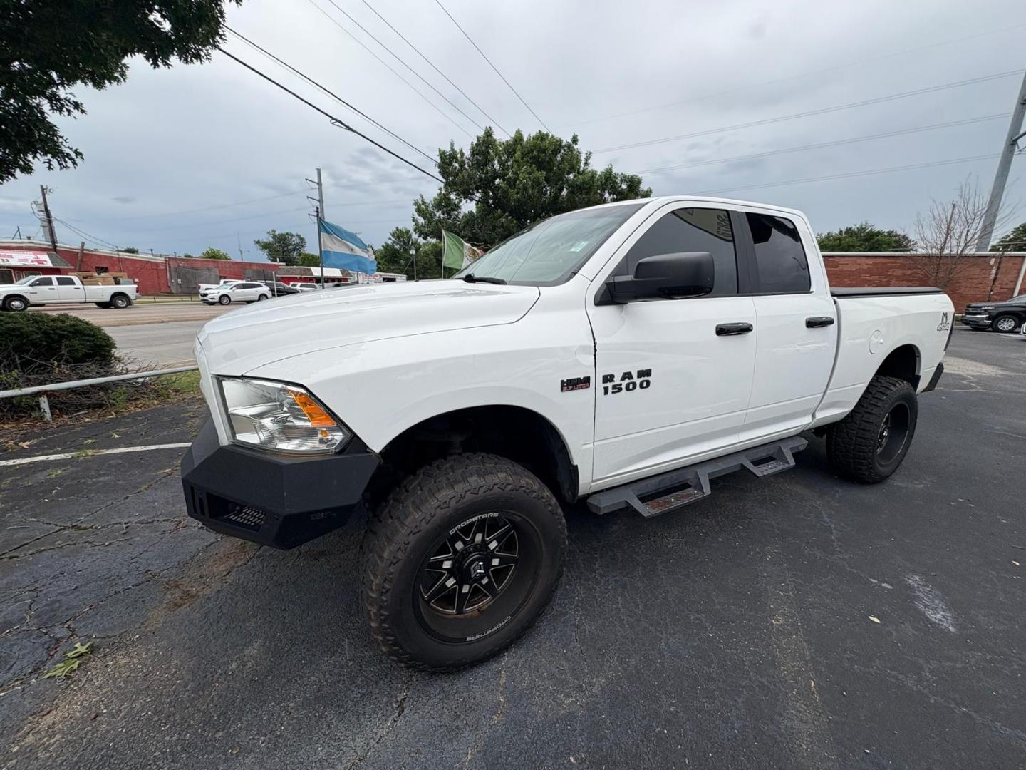 2017 White RAM 1500 SLT Quad Cab 4WD (1C6RR7GT6HS) with an 5.7L V8 OHV 16V engine, 8A transmission, located at 945 E. Jefferson Blvd, Dallas, TX, 75203, (214) 943-7777, 32.752514, -96.811630 - Photo#0