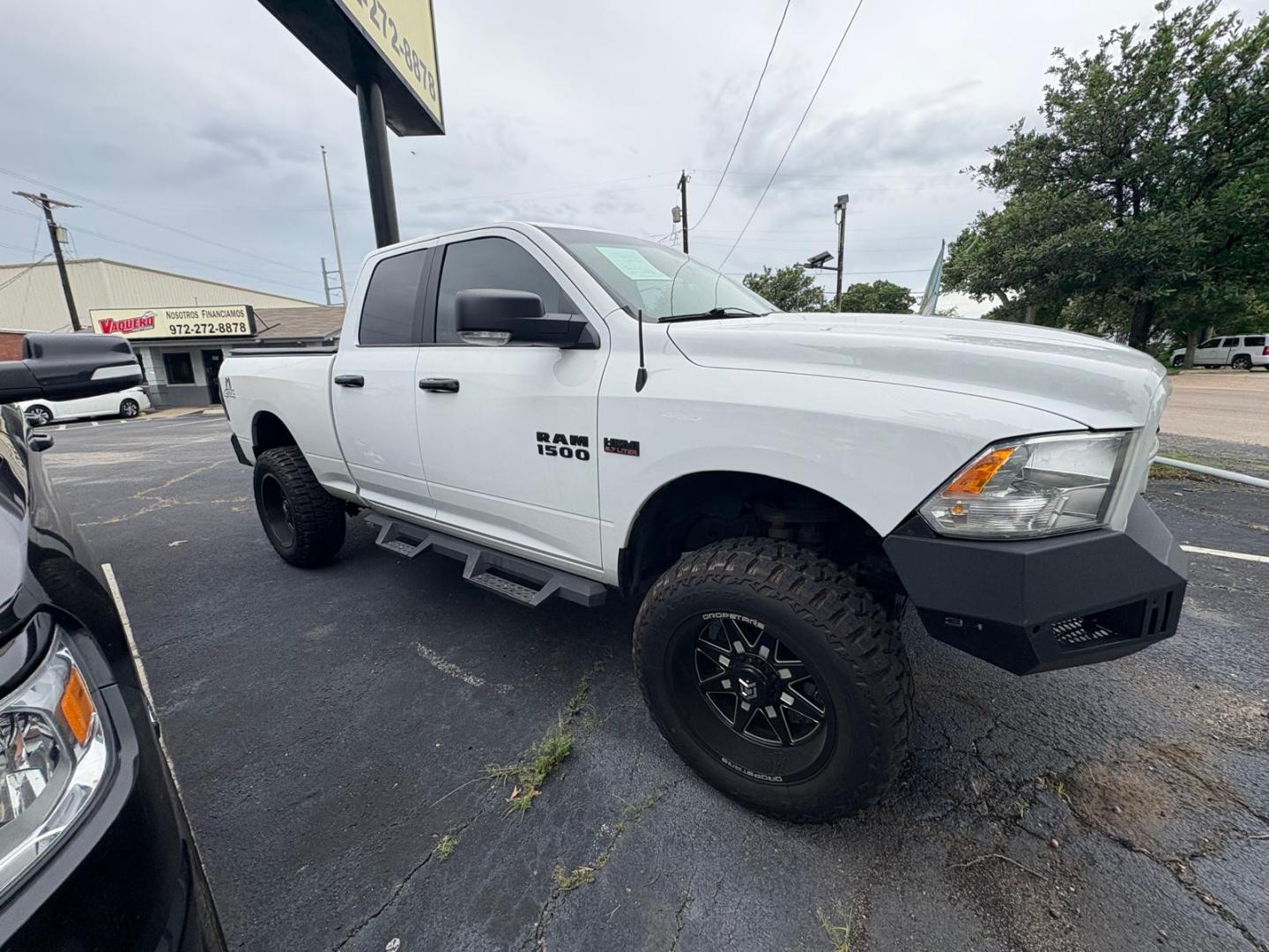 2017 White RAM 1500 SLT Quad Cab 4WD (1C6RR7GT6HS) with an 5.7L V8 OHV 16V engine, 8A transmission, located at 945 E. Jefferson Blvd, Dallas, TX, 75203, (214) 943-7777, 32.752514, -96.811630 - Photo#2