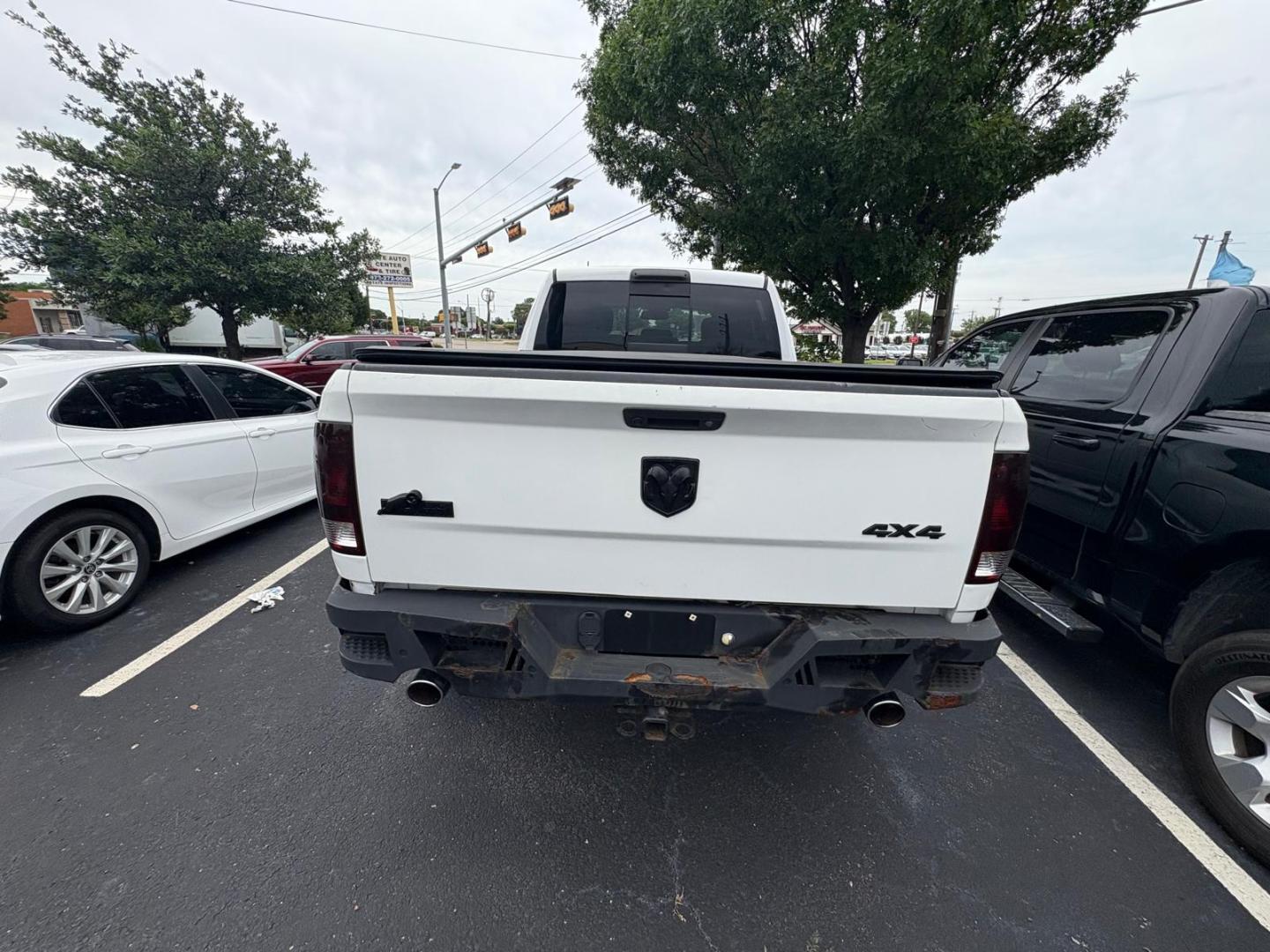 2017 White RAM 1500 SLT Quad Cab 4WD (1C6RR7GT6HS) with an 5.7L V8 OHV 16V engine, 8A transmission, located at 945 E. Jefferson Blvd, Dallas, TX, 75203, (214) 943-7777, 32.752514, -96.811630 - Photo#3