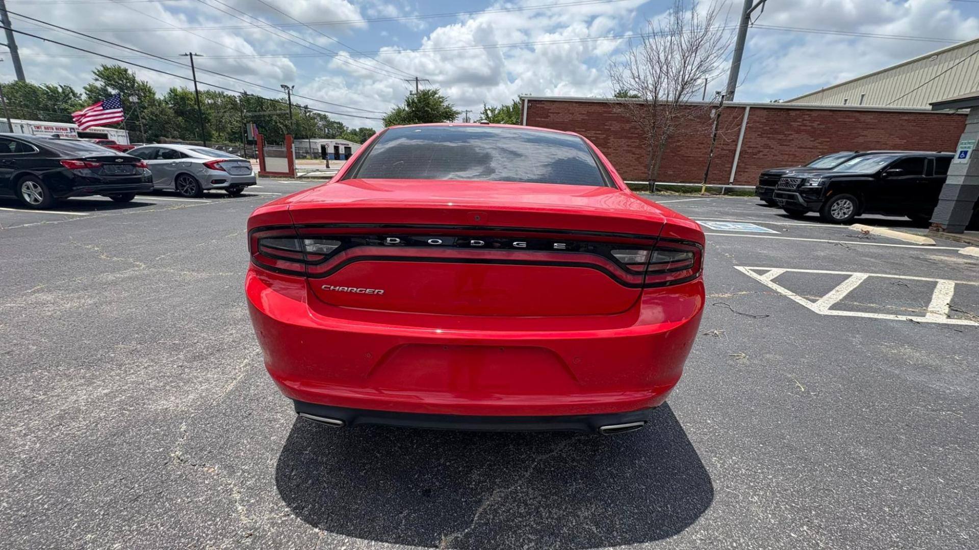 2020 Red Dodge Charger SXT (2C3CDXBG1LH) with an 3.6L V6 DOHC 24V engine, 8A transmission, located at 945 E. Jefferson Blvd, Dallas, TX, 75203, (214) 943-7777, 32.752514, -96.811630 - Photo#3