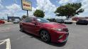 2018 Red Toyota Camry LE (4T1B11HK6JU) with an 2.5L L4 DOHC 16V engine, 8A transmission, located at 945 E. Jefferson Blvd, Dallas, TX, 75203, (214) 943-7777, 32.752514, -96.811630 - Photo#2