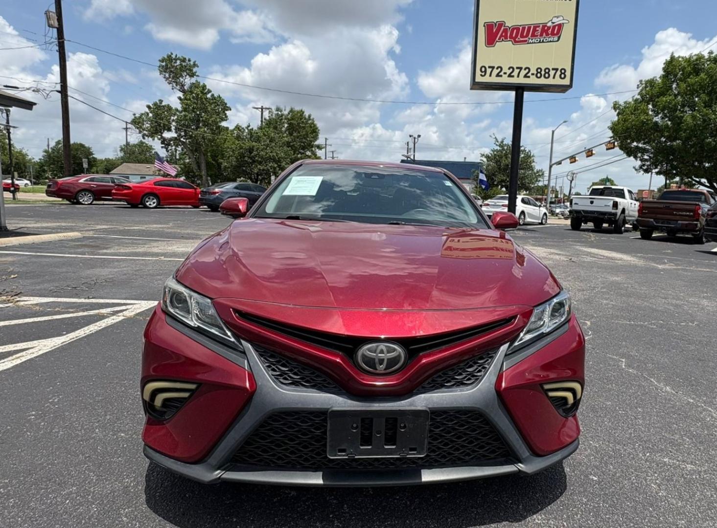 2018 Red Toyota Camry LE (4T1B11HK6JU) with an 2.5L L4 DOHC 16V engine, 8A transmission, located at 945 E. Jefferson Blvd, Dallas, TX, 75203, (214) 943-7777, 32.752514, -96.811630 - Photo#1