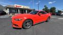 2016 Orange Ford Mustang EcoBoost Coupe (1FA6P8TH8G5) with an 2.3L L4 DOHC 16V engine, located at 945 E. Jefferson Blvd, Dallas, TX, 75203, (214) 943-7777, 32.752514, -96.811630 - Photo#0