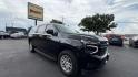 2021 Black Chevrolet Suburban LS (1GNSCBKD2MR) with an 5.3L V8 OHV 16V engine, 10A transmission, located at 945 E. Jefferson Blvd, Dallas, TX, 75203, (214) 943-7777, 32.752514, -96.811630 - Photo#2