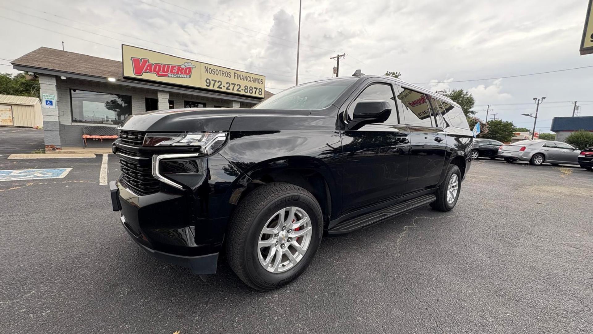 2021 Black Chevrolet Suburban LS (1GNSCBKD2MR) with an 5.3L V8 OHV 16V engine, 10A transmission, located at 945 E. Jefferson Blvd, Dallas, TX, 75203, (214) 943-7777, 32.752514, -96.811630 - Photo#0