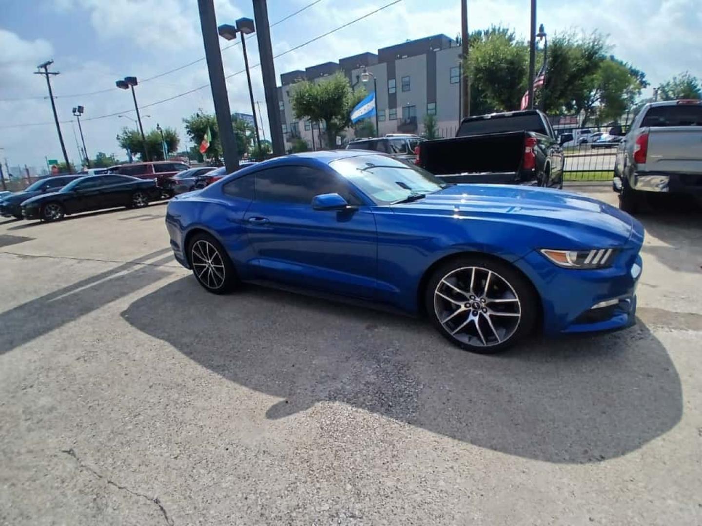 2017 Blue Ford Mustang EcoBoost Coupe (1FA6P8TH4H5) with an 2.3L L4 DOHC 16V engine, located at 945 E. Jefferson Blvd, Dallas, TX, 75203, (214) 943-7777, 32.752514, -96.811630 - Photo#2
