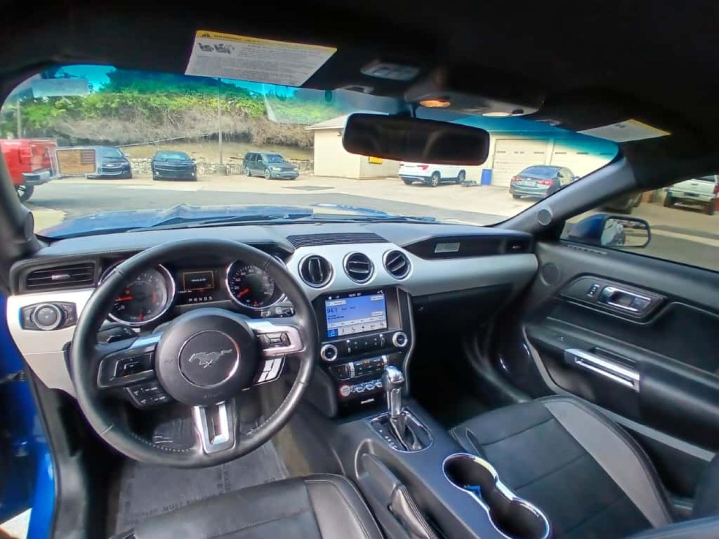 2017 Blue Ford Mustang EcoBoost Coupe (1FA6P8TH4H5) with an 2.3L L4 DOHC 16V engine, located at 945 E. Jefferson Blvd, Dallas, TX, 75203, (214) 943-7777, 32.752514, -96.811630 - Photo#4