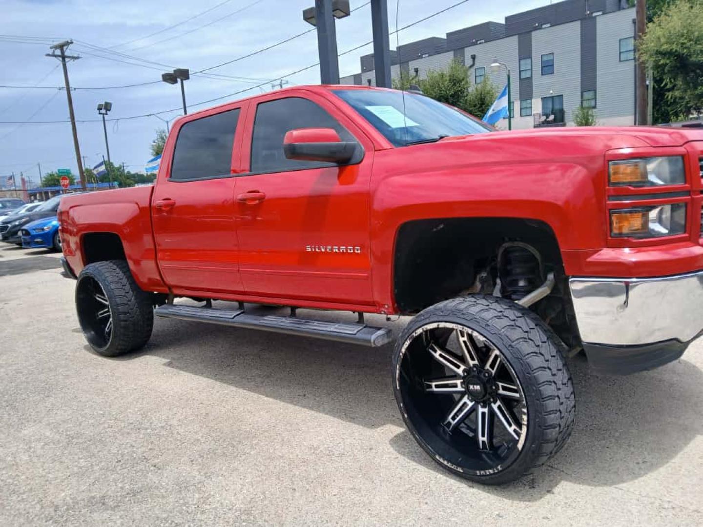 2015 Red Chevrolet Silverado 1500 LT Crew Cab 4WD (3GCUKREC4FG) with an 5.3L V8 OHV 16V engine, 6-Speed Automatic transmission, located at 945 E. Jefferson Blvd, Dallas, TX, 75203, (214) 943-7777, 32.752514, -96.811630 - Photo#2