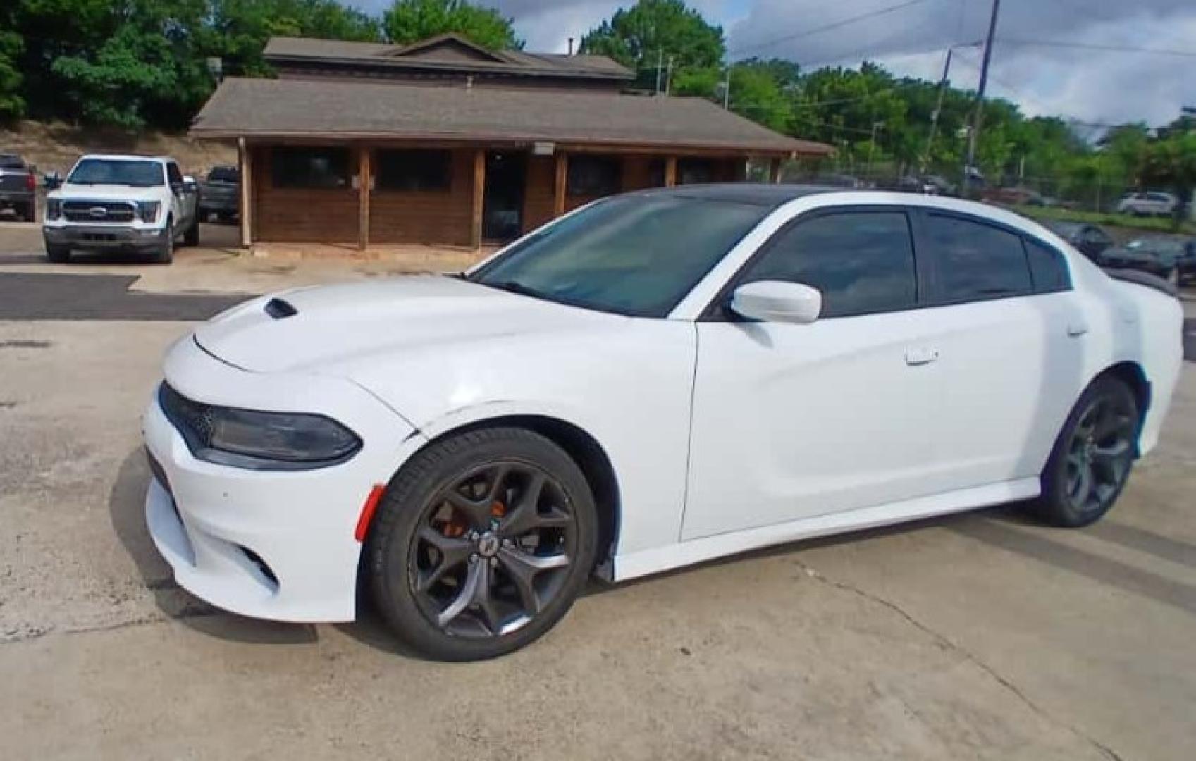 2019 White Dodge Charger SXT Plus (2C3CDXHG7KH) with an 3.6L V6 DOHC 24V engine, 8A transmission, located at 945 E. Jefferson Blvd, Dallas, TX, 75203, (214) 943-7777, 32.752514, -96.811630 - Photo#0