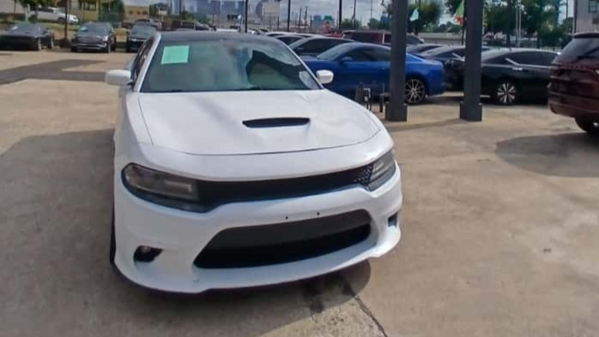 2019 White Dodge Charger SXT Plus (2C3CDXHG7KH) with an 3.6L V6 DOHC 24V engine, 8A transmission, located at 945 E. Jefferson Blvd, Dallas, TX, 75203, (214) 943-7777, 32.752514, -96.811630 - Photo#1