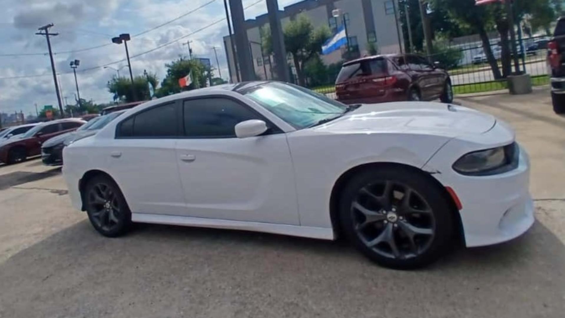 2019 White Dodge Charger SXT Plus (2C3CDXHG7KH) with an 3.6L V6 DOHC 24V engine, 8A transmission, located at 945 E. Jefferson Blvd, Dallas, TX, 75203, (214) 943-7777, 32.752514, -96.811630 - Photo#2