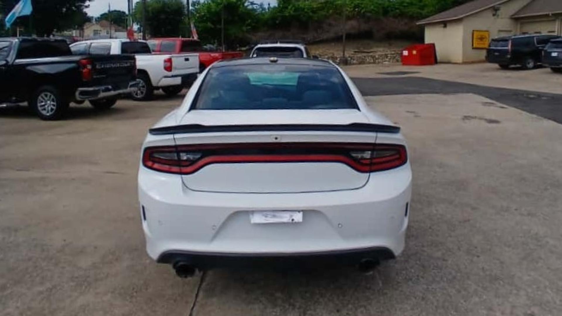 2019 White Dodge Charger SXT Plus (2C3CDXHG7KH) with an 3.6L V6 DOHC 24V engine, 8A transmission, located at 945 E. Jefferson Blvd, Dallas, TX, 75203, (214) 943-7777, 32.752514, -96.811630 - Photo#3