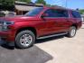 2016 Red Chevrolet Suburban LT 2WD (1GNSCHKC2GR) with an 5.3L V8 OHV 16V engine, 6A transmission, located at 945 E. Jefferson Blvd, Dallas, TX, 75203, (214) 943-7777, 32.752514, -96.811630 - Photo#0