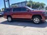 2016 Red Chevrolet Suburban LT 2WD (1GNSCHKC2GR) with an 5.3L V8 OHV 16V engine, 6A transmission, located at 945 E. Jefferson Blvd, Dallas, TX, 75203, (214) 943-7777, 32.752514, -96.811630 - Photo#2