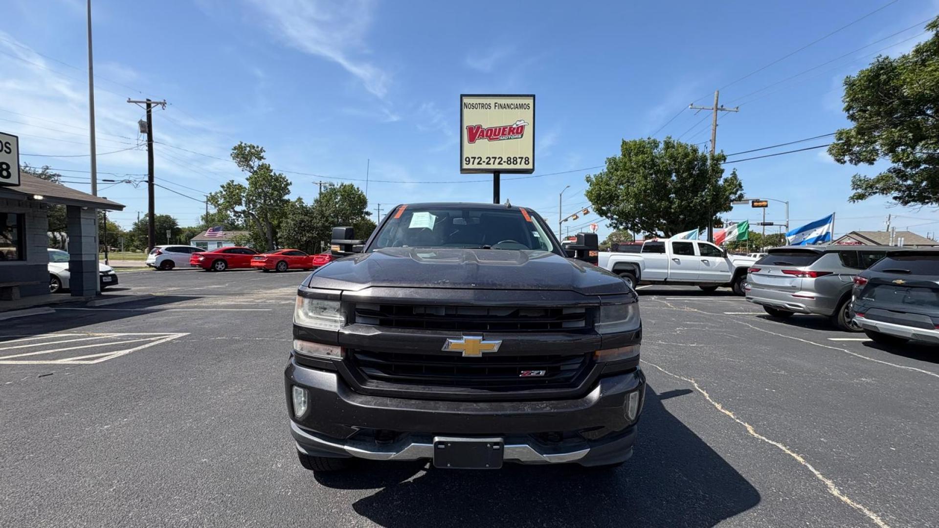 2016 Black Chevrolet Silverado 1500 LT Crew Cab 4WD (3GCUKREC2GG) with an 5.3L V8 OHV 16V engine, 6A transmission, located at 945 E. Jefferson Blvd, Dallas, TX, 75203, (214) 943-7777, 32.752514, -96.811630 - Photo#1