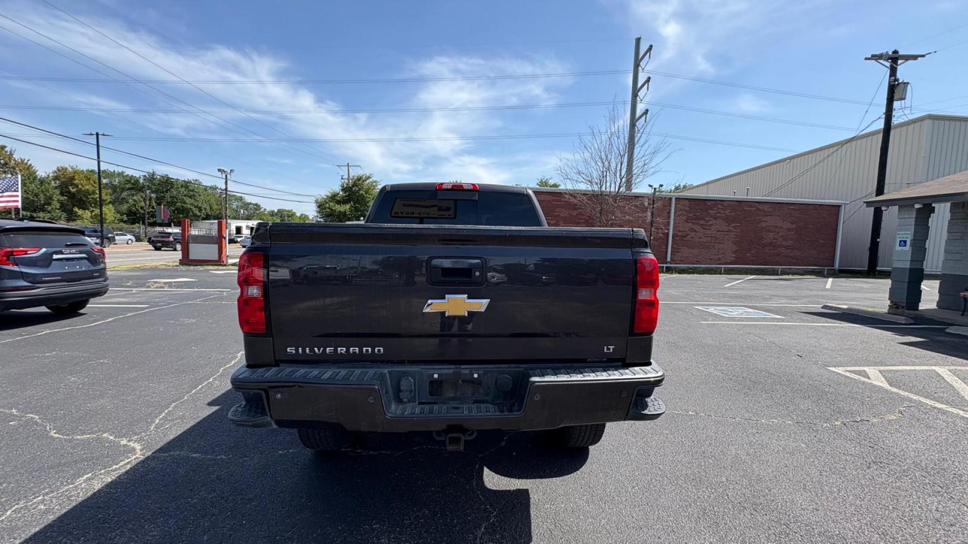 2016 Black Chevrolet Silverado 1500 LT Crew Cab 4WD (3GCUKREC2GG) with an 5.3L V8 OHV 16V engine, 6A transmission, located at 945 E. Jefferson Blvd, Dallas, TX, 75203, (214) 943-7777, 32.752514, -96.811630 - Photo#3