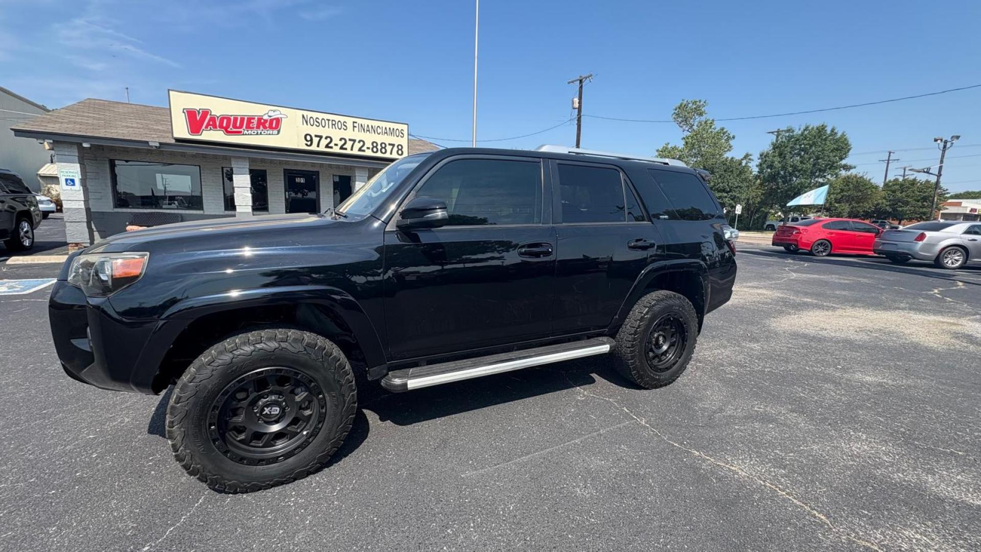 2016 Black Toyota 4Runner SR5 4WD (JTEBU5JR9G5) with an 4.0L V6 DOHC 24V engine, 5A transmission, located at 945 E. Jefferson Blvd, Dallas, TX, 75203, (214) 943-7777, 32.752514, -96.811630 - Photo#0
