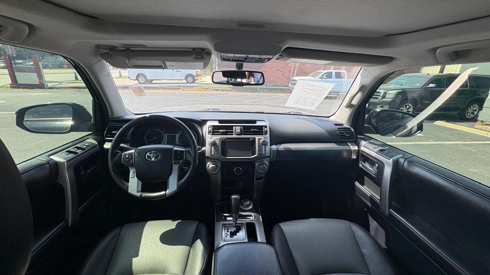 2016 Black Toyota 4Runner SR5 4WD (JTEBU5JR9G5) with an 4.0L V6 DOHC 24V engine, 5A transmission, located at 945 E. Jefferson Blvd, Dallas, TX, 75203, (214) 943-7777, 32.752514, -96.811630 - Photo#4