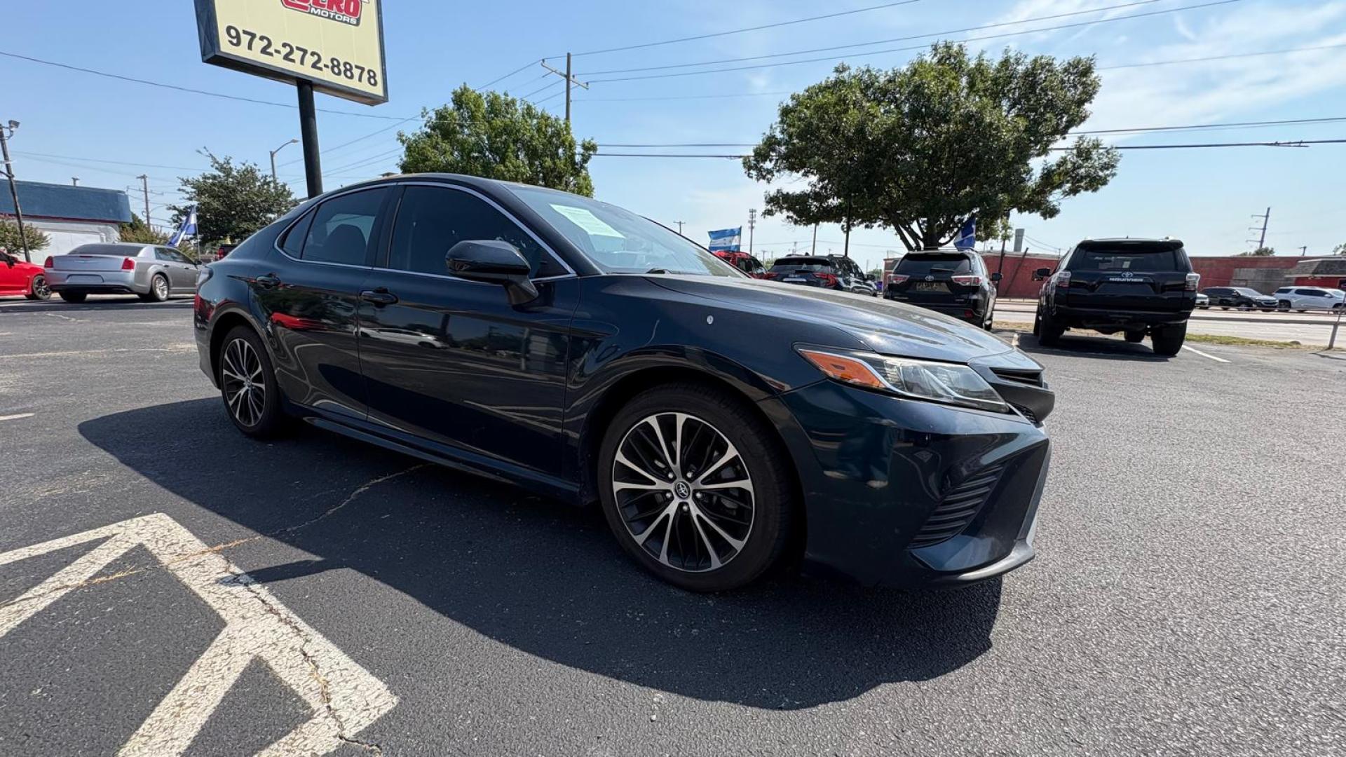 2019 Blue Toyota Camry LE (4T1B11HK2KU) with an 2.5L L4 DOHC 16V engine, 8A transmission, located at 945 E. Jefferson Blvd, Dallas, TX, 75203, (214) 943-7777, 32.752514, -96.811630 - Photo#2