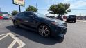 2019 Blue Toyota Camry LE (4T1B11HK2KU) with an 2.5L L4 DOHC 16V engine, 8A transmission, located at 945 E. Jefferson Blvd, Dallas, TX, 75203, (214) 943-7777, 32.752514, -96.811630 - Photo#2